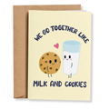 A cute greeting card with a kraft envelope, featuring a cartoon cookie and milk glass with the text 'WE GO TOGETHER LIKE MILK AND COOKIES'.