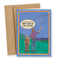A greeting card with a brown kraft envelope behind it. The card features a cartoon illustration of a man and a child in a field at night, with the man pointing up at a starry sky.