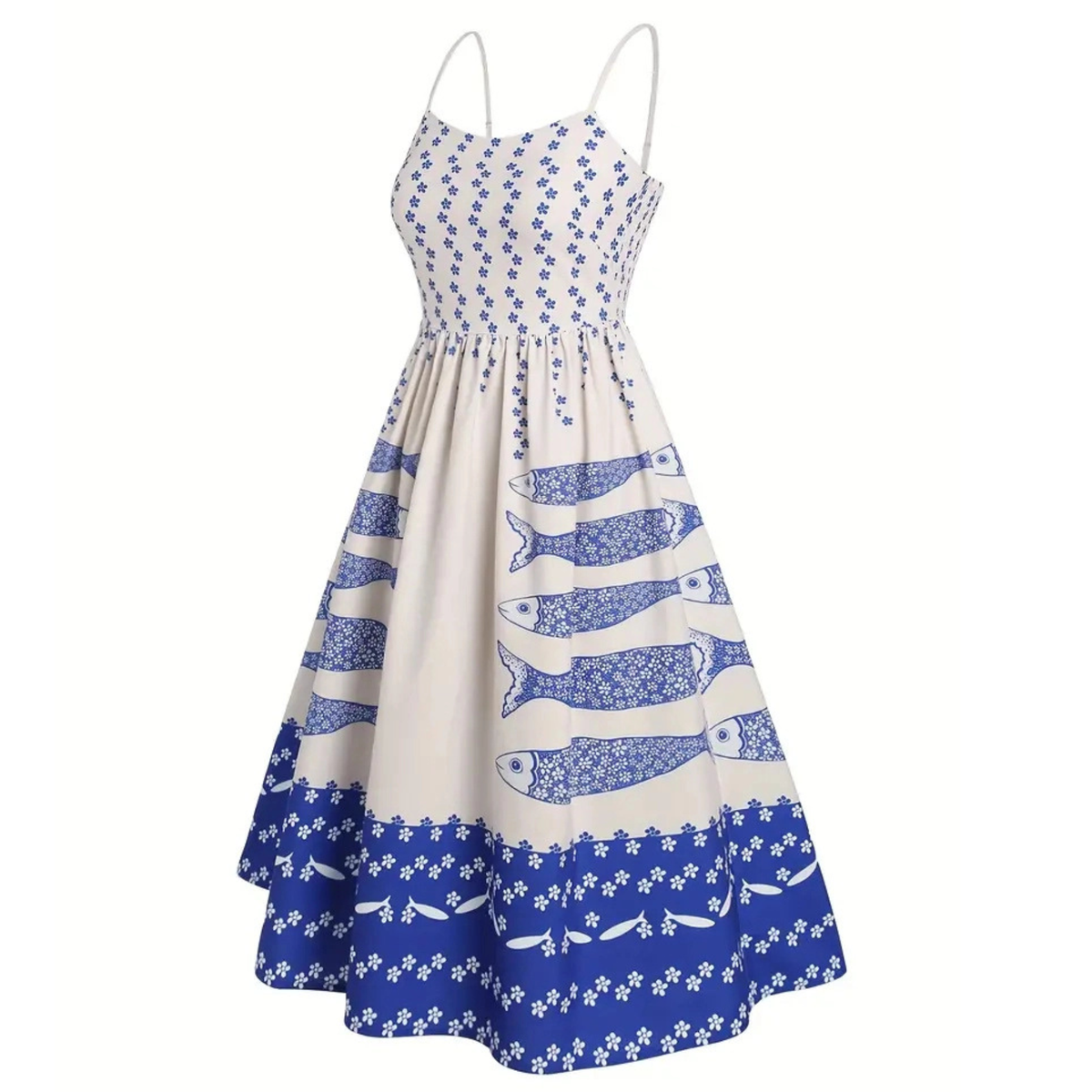 A sleeveless A-line midi dress with thin spaghetti straps, featuring a blue and white fish print pattern on an off-white base, shown against a plain white background.