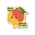A die-cut sticker featuring a cute, grumpy cartoon peach with the text 'don't be a peach of shit' in dark green. The sticker has a textured cream background and is shown on a clean white backdrop with a soft drop shadow.