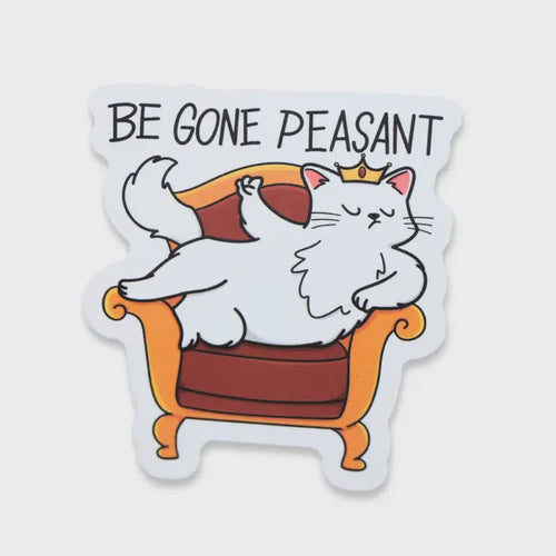 A die-cut sticker featuring a cartoon white cat lounging in an orange armchair with a crown, above the text 'BE GONE PEASANT' on a light gray background.